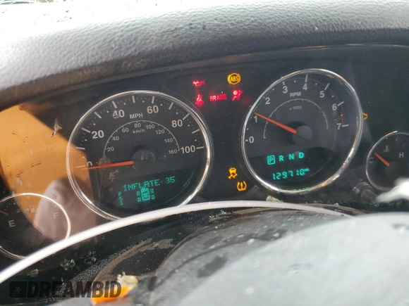 2016 Jeep Wrangler Sport with VIN 1C4AJWAG7GL297681, listed as a Copart auction lot 55926715 with 129,710 mi miles and Salvage title. Bid and sale history available at DreamBid. Image 9.