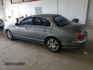 2003 Jaguar S-Type z VIN SAJEA01U93HM88490, wystawiony jako Copart lot #55721795 z przebiegiem 192 773 mil mil oraz Tytuł czysty. Historia ofert i sprzedaży dostępna na DreamBid. Obrazek 2.
