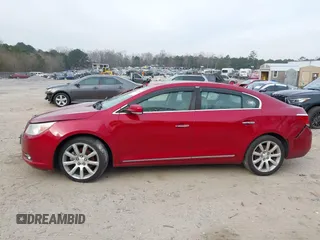 2013 Buick LaCrosse Touring z VIN 1G4GJ5E30DF289424, wystawiony jako IAAI lot #41248367 z przebiegiem 119 732 mil mil oraz . Historia ofert i sprzedaży dostępna na DreamBid. Obrazek 14.