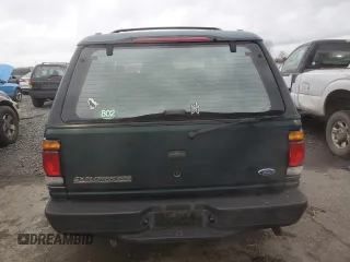 1997 Ford Explorer with VIN 1FMCU24E5VUB71602, listed as a Copart auction lot 87081674 with 193,534 mi miles and Salvage title. Bid and sale history available at DreamBid. Image 6.