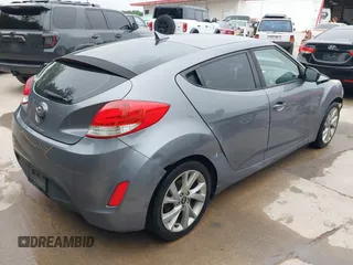 2016 Hyundai Veloster with VIN KMHTC6AD2GU300548, listed as a IAAI auction lot 42439901 with 134,012 mi miles and . Bid and sale history available at DreamBid. Image 4.