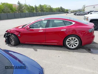 2018 Tesla Model S 75D with VIN 5YJSA1E29JF273494, listed as a IAAI auction lot 42246104 with 93,870 mi miles and . Bid and sale history available at DreamBid. Image 14.