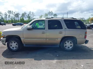 2005 Chevrolet Tahoe LT z VIN 1GNEC13T05J164155, wystawiony jako IAAI lot #42015852 z przebiegiem 216 683 mil mil oraz . Historia ofert i sprzedaży dostępna na DreamBid. Obrazek 14.