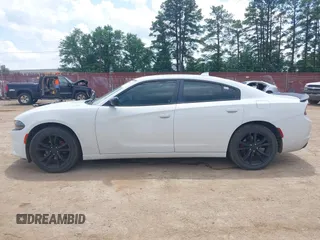2016 Dodge Charger SXT with VIN 2C3CDXHG1GH174892, listed as a IAAI auction lot 42096098 with 244,598 mi miles and . Bid and sale history available at carsss.com. Image 14.