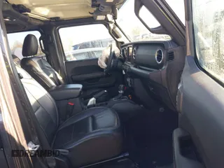 2018 Jeep Wrangler Unlimited Sahara with VIN 1C4HJXEN5JW203879, listed as a IAAI auction lot 41131467 with 87,065 mi miles and . Bid and sale history available at DreamBid. Image 5.