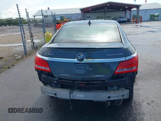 2016 Buick LaCrosse Sport Touring with VIN 1G4G45G34GF266706, listed as a IAAI auction lot 42619621 with 74,190 mi miles and . Bid and sale history available at DreamBid. Image 17.