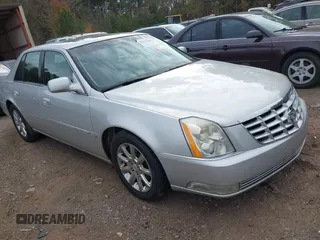 2009 Cadillac DTS w/1SA with VIN 1G6KD57Y29U141277, listed as a IAAI auction lot 41014185 with 164,622 mi miles. Bid and sale history available at carsss.com. Image 1.