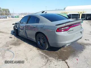 2019 Dodge Charger SXT with VIN 2C3CDXJG1KH537825, listed as a IAAI auction lot 41482387 with 71,062 mi miles and . Bid and sale history available at DreamBid. Image 3.