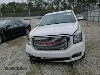 2015 GMC Yukon Denali with VIN 1GKS1CKJ1FR526594, listed as a Copart auction lot 46524205 with 99,095 mi miles and Salvage Title. Bid and sale history available at carsss.com. Image 12.