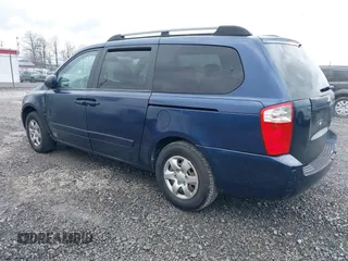 2009 Kia Sedona LX with VIN KNDMB233696278019, listed as a IAAI auction lot 41983960 with 153,083 mi miles. Bid and sale history available at carsss.com. Image 3.