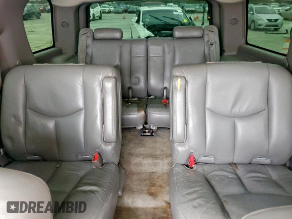 2004 Chevrolet Tahoe LS z VIN 1GNEC13Z14R249851, wystawiony jako Copart lot #48236485 z przebiegiem 185 088 mil mil oraz Szkoda całkowita • Salvage title. Historia ofert i sprzedaży dostępna na DreamBid. Obrazek 10.