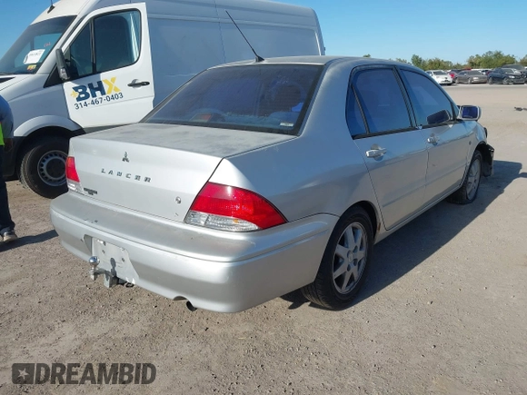 2002 Mitsubishi Lancer LS with VIN JA3AJ36E22U035784, listed as a IAAI auction lot 40628995 with 1 mi miles. Bid and sale history available at carsss.com. Image 4.