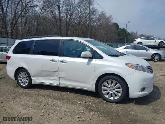 2015 Toyota Sienna XLE with VIN 5TDYK3DC0FS570007, listed as a IAAI auction lot 41794333 with 217,512 mi miles. Bid and sale history available at carsss.com. Image 13.