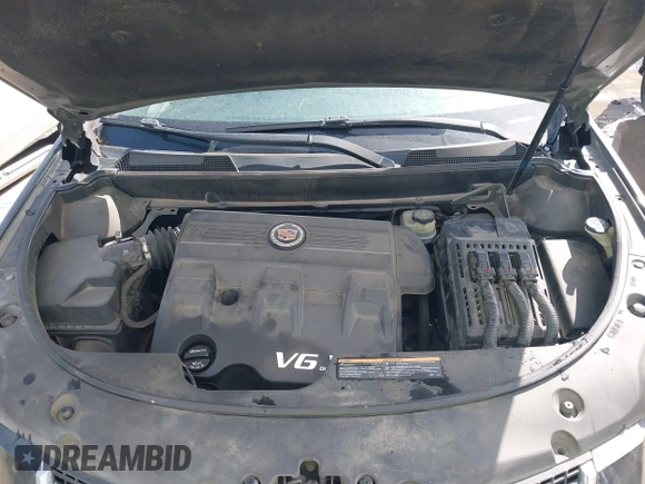 2013 Cadillac SRX Performance Collection with VIN 3GYFNDE38DS598028, listed as a IAAI auction lot 41452362 with 201,261 mi miles and . Bid and sale history available at DreamBid. Image 10.