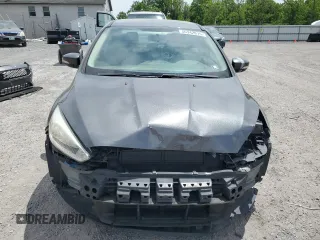 2017 Ford Focus SE with VIN 1FADP3F2XHL201380, listed as a Copart auction lot 56942815 with 136,169 mi miles and Salvage title. Bid and sale history available at DreamBid. Image 5.