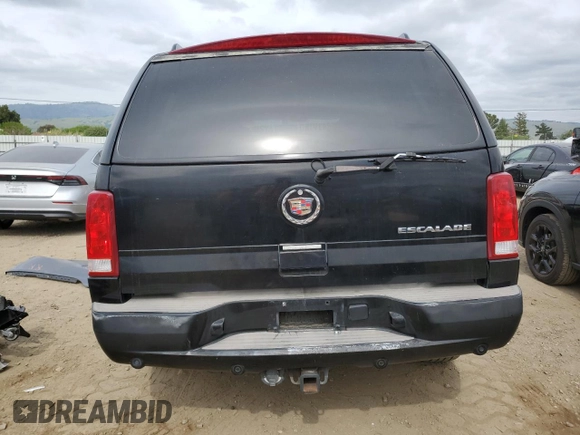 2004 Cadillac Escalade z VIN 1GYEC63T64R260162, wystawiony jako Copart lot #54725685 z przebiegiem 223 615 mil mil oraz Szkoda całkowita • Salvage title. Historia ofert i sprzedaży dostępna na DreamBid. Obrazek 6.