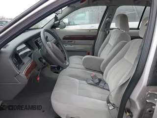 2004 Mercury Grand Marquis GS with VIN 2MEFM74W84X634345, listed as a IAAI auction lot 41920110 with 97,749 mi miles and . Bid and sale history available at DreamBid. Image 5.