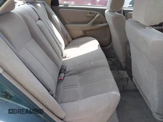 2001 Toyota Camry CE z VIN JT2BG22K310536515, wystawiony jako IAAI lot #42409847 z przebiegiem 205 978 mil mil oraz . Historia ofert i sprzedaży dostępna na DreamBid. Obrazek 8.