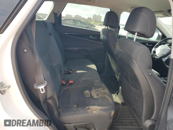 2017 Kia Sorento LX z VIN 5XYPG4A34HG220340, wystawiony jako Copart lot #57467775 z przebiegiem 144 612 mil mil oraz Szkoda całkowita • Salvage title. Historia ofert i sprzedaży dostępna na DreamBid. Obrazek 11.