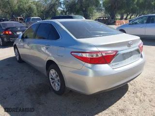 2015 Toyota Camry XLE with VIN 4T4BF1FK9FR499888, listed as a IAAI auction lot 41676657 with 148,310 mi miles. Bid and sale history available at carsss.com. Image 3.