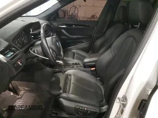 2018 BMW X1 xDrive28i with VIN WBXHT3C30J5K29917, listed as a Copart auction lot 56165845 with 131,876 mi miles and Salvage title. Bid and sale history available at DreamBid. Image 7.
