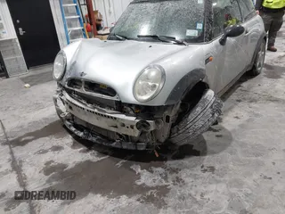 2002 MINI Hardtop with VIN WMWRC33422TC37296, listed as a IAAI auction lot 41385046 with 107,663 mi miles and . Bid and sale history available at DreamBid. Image 6.