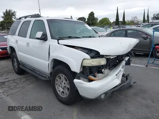 2002 Chevrolet Tahoe Z71 z VIN 1GNEK13Z72R300592, wystawiony jako IAAI lot #41781439 z przebiegiem 229 028 mil mil oraz . Historia ofert i sprzedaży dostępna na DreamBid. Obrazek 1.