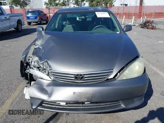 2005 Toyota Camry LE with VIN 4T1BF32K25U603812, listed as a IAAI auction lot 41740671 with 242,316 mi miles and . Bid and sale history available at DreamBid. Image 6.