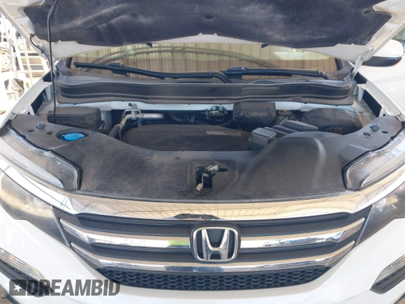 2018 Honda Pilot EX-L with VIN 5FNYF5H54JB009785, listed as a IAAI auction lot 41667784 with 67,296 mi miles. Bid and sale history available at carsss.com. Image 10.