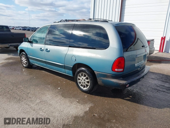 1998 Plymouth Voyager Grand SE z VIN 2P4GP44G4WR654454, wystawiony jako IAAI lot #41736791 z przebiegiem 80 000 mil mil oraz . Historia ofert i sprzedaży dostępna na DreamBid. Obrazek 3.
