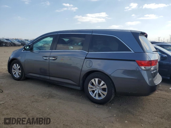 2014 Honda Odyssey EX-L with VIN 5FNRL5H64EB123541, listed as a Copart auction lot 52483705 with 77,996 mi miles and Salvage Title. Bid and sale history available at DreamBid. Image 2.