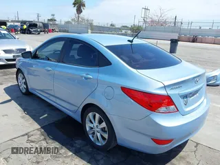2012 Hyundai Accent GLS z VIN KMHCU4AE1CU057299, wystawiony jako IAAI lot #42130443 z przebiegiem 65 901 mil mil oraz . Historia ofert i sprzedaży dostępna na DreamBid. Obrazek 3.