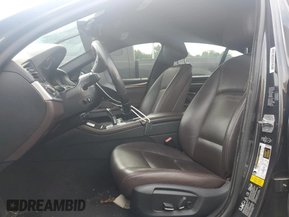 2014 BMW 5 Series 528i xDrive with VIN WBA5A7C52ED616475, listed as a Copart auction lot 64597745 with 91,306 mi miles and Salvage title. Bid and sale history available at DreamBid. Image 7.