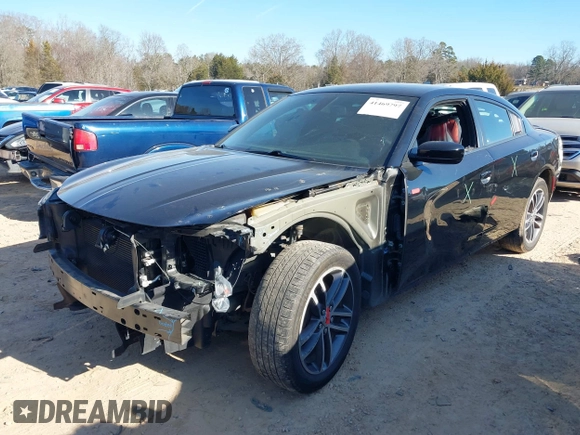 2019 Dodge Charger SXT with VIN 2C3CDXJG4KH710673, listed as a IAAI auction lot 41469797 with 102,011 mi miles and . Bid and sale history available at DreamBid. Image 18.