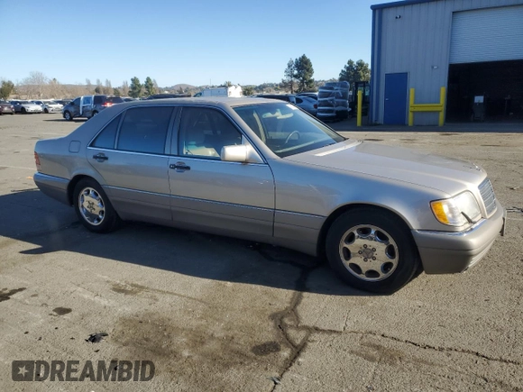1995 Mercedes-Benz S with VIN WDBGA51E4SA202452, listed as a Copart auction lot 42133385 with 165,561 mi miles and Clean Title. Bid and sale history available at DreamBid. Image 4.