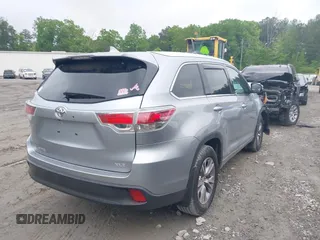 2014 Toyota Highlander XLE z VIN 5TDKKRFH1ES024090, wystawiony jako IAAI lot #42123199 z przebiegiem 58 751 mil mil oraz . Historia ofert i sprzedaży dostępna na DreamBid. Obrazek 4.
