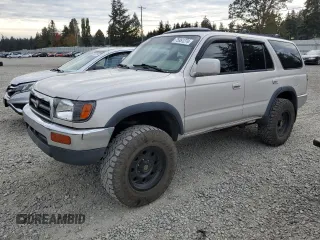 1997 Toyota 4Runner SR5 z VIN JT3HN86R4V0069732, wystawiony jako Copart lot #75951274 z przebiegiem 162 700 mil mil oraz Szkoda całkowita • Salvage title. Historia ofert i sprzedaży dostępna na DreamBid. Obrazek 1.