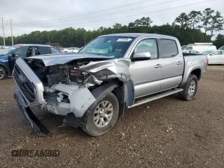 2018 Toyota Tacoma SR5 с VIN 5TFAZ5CN6JX062848, выставлен на аукционе Copart как лот 57224695 с пробегом 180 875 миль миль и Списание • Salvage title. История ставок и продаж доступна на DreamBid. Изображение 1.