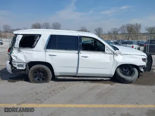 2020 Chevrolet Tahoe Commercial with VIN 1GNSKDEC5LR261015, listed as a IAAI auction lot 42001083 with 110,668 mi miles. Bid and sale history available at carsss.com. Image 13.