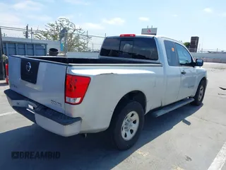 2006 Nissan Titan SE with VIN 1N6AA06A06N542516, listed as a IAAI auction lot 42736458 with 157,824 mi miles and . Bid and sale history available at DreamBid. Image 4.