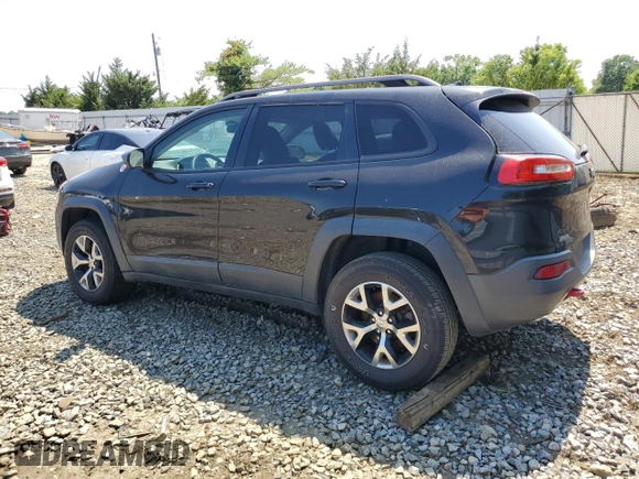 2015 Jeep Cherokee Trailhawk with VIN 1C4PJMBS6FW785891, listed as a Copart auction lot 61040565 with 156,421 mi miles and Clean title. Bid and sale history available at DreamBid. Image 2.