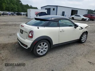 2014 MINI Coupe S z VIN WMWSX3C5XET409347, wystawiony jako Copart lot #56321384 z przebiegiem 81 070 mil mil oraz Szkody całkowita. Historia ofert i sprzedaży dostępna na DreamBid. Obrazek 3.