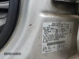 2004 Mazda Tribute ES with VIN 4F2CZ96104KM18818, listed as a Copart auction lot 68863884 with 317,983 mi miles and Salvage Title. Bid and sale history available at carsss.com. Image 12.