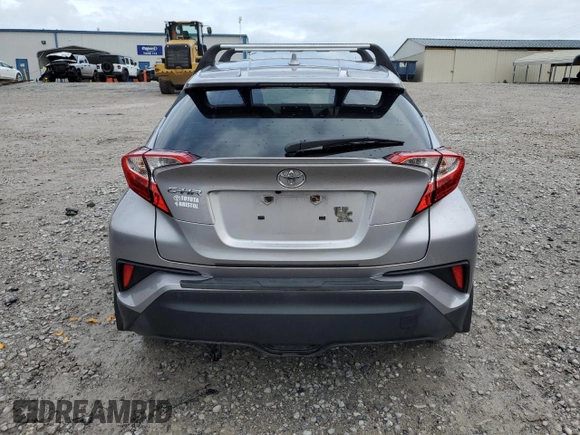 2019 Toyota C-HR XLE with VIN JTNKHMBX7K1048428, listed as a Copart auction lot 51943135 with 82,957 mi miles and Salvage Title. Bid and sale history available at carsss.com. Image 6.
