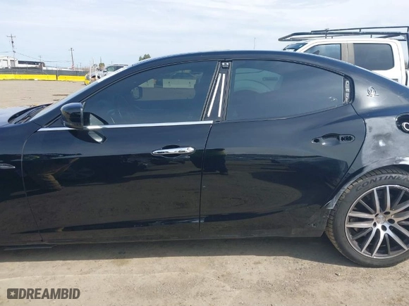 2015 Maserati Ghibli with VIN ZAM57XSA9F1146055, listed as a IAAI auction lot 41814633 with 88,783 mi miles. Bid and sale history available at carsss.com. Image 15.