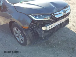 2020 Honda Odyssey EX with VIN 5FNRL6H54LB052660, listed as a IAAI auction lot 42051157 with 51,159 mi miles and . Bid and sale history available at DreamBid. Image 18.