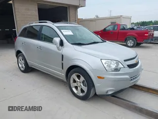 2014 Chevrolet Captiva Sport LTZ z VIN 3GNAL4EKXES645176, wystawiony jako IAAI lot #41301924 z przebiegiem 116 906 mil mil oraz . Historia ofert i sprzedaży dostępna na DreamBid. Obrazek 1.