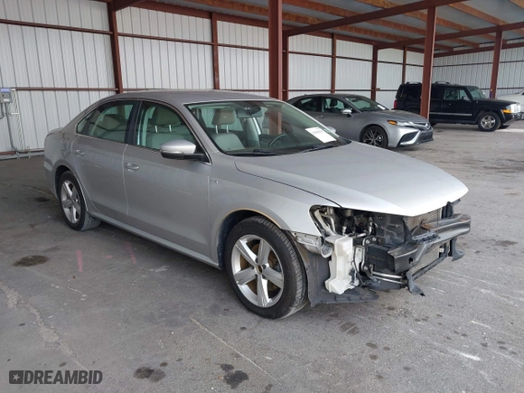 2014 Volkswagen Passat Wolfsburg Ed with VIN 1VWAS7A32EC036193, listed as a IAAI auction lot 41606595 with 77,536 mi miles. Bid and sale history available at carsss.com. Image 1.