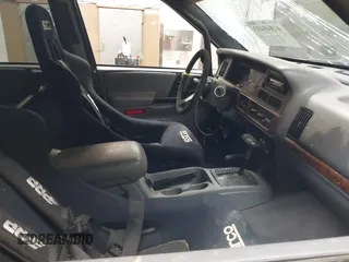 1998 Jeep Grand Cherokee Laredo with VIN 1J4GZ48Y9WC206957, listed as a IAAI auction lot 41848433 with 122,104 mi miles. Bid and sale history available at carsss.com. Image 5.