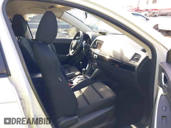 2014 Mazda CX-5 Touring with VIN JM3KE2CY5E0329783, listed as a IAAI auction lot 42017473 with 121,175 mi miles. Bid and sale history available at carsss.com. Image 5.